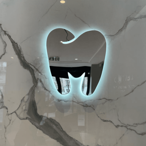 Logo découpée pour Dentimad, réalisé par Atelier Gambetta